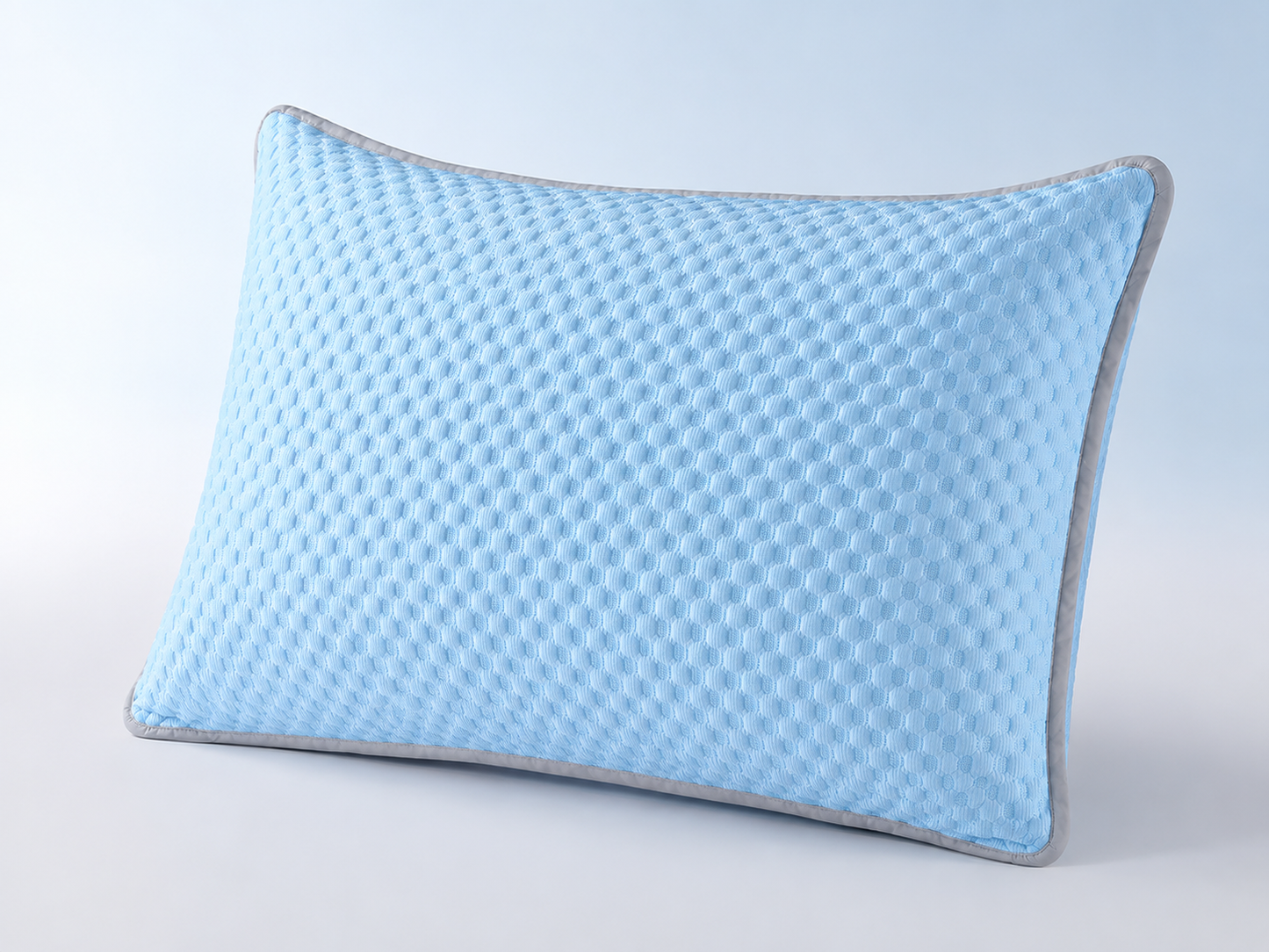 Breathable cooling pillowcase made from ice silk fabric in light blue