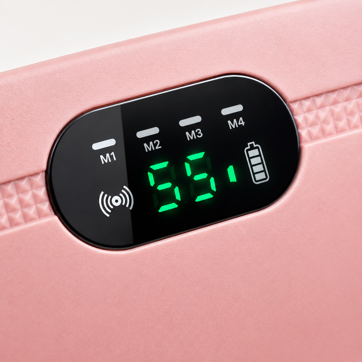 Close-up of the Premium heat and massage belt LED display showing four heat levels and four massage modes